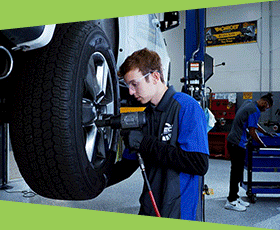 Teenagers and young adults learning hands-on in J-Tech's various labs.
